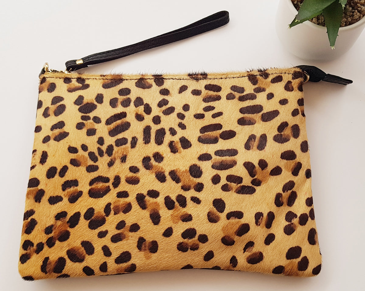 The stunning Leopard Print Clutch Bag Neonstar