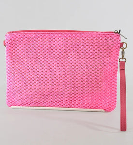 Bright pink rattan clutch bag